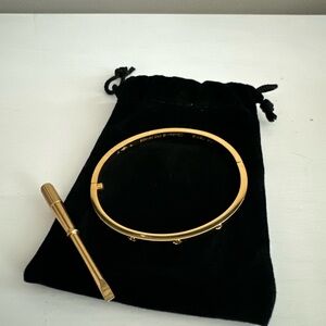 Gold bangle bracelet